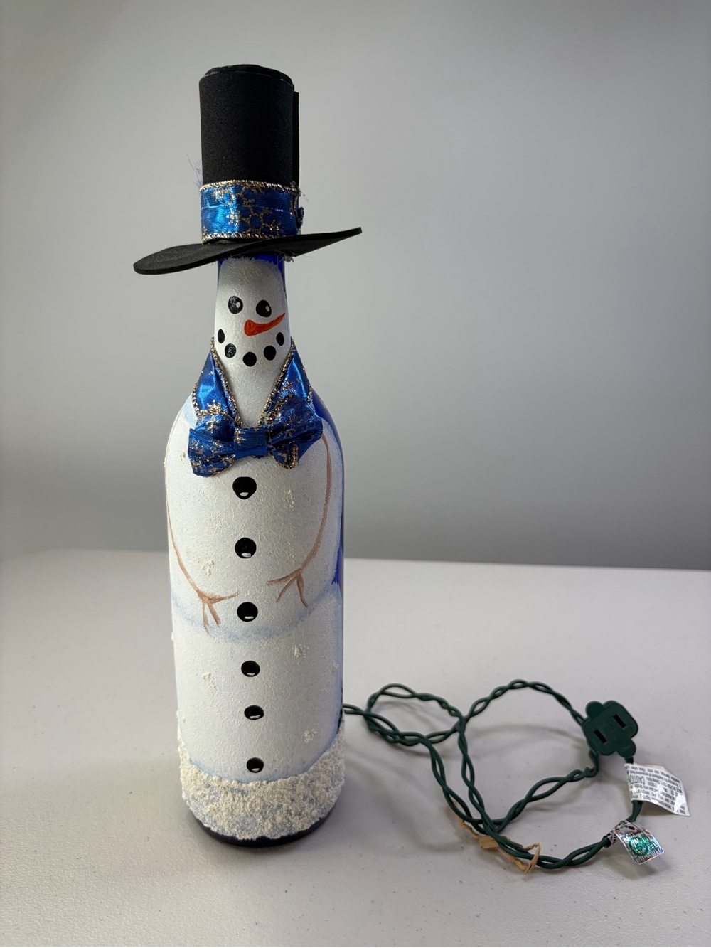 Handcrafted Blue and White Snowman painted Bottle Holiday /winter Decor